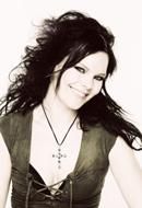 Anette Olzon - Anette Olzon was raised in a musical family and - ^(*)Membrii^(*)